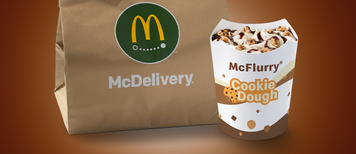 McFlurry®, daneben eine McDelivery® Tüte