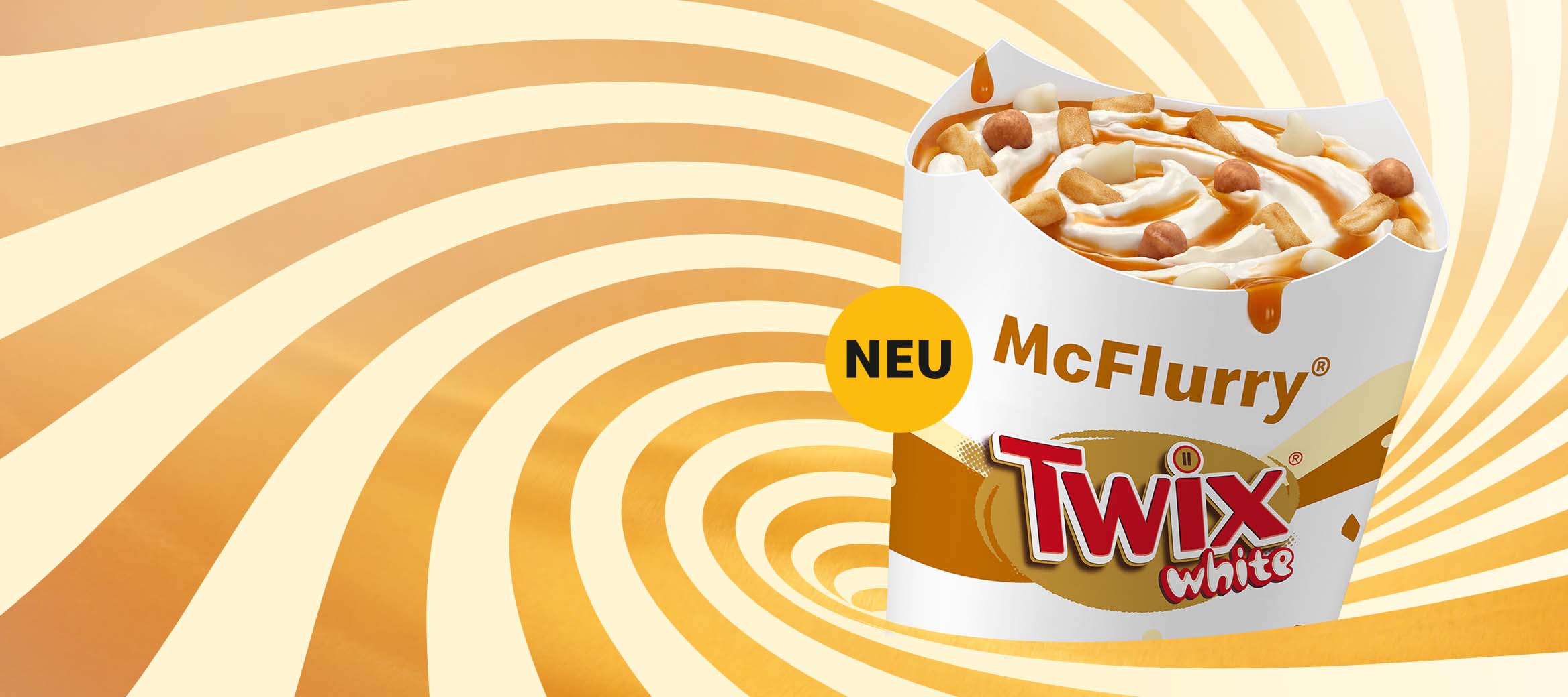Der neue McFlurry® Original mit TWIX® White-Topping und Karamell-Sauce.