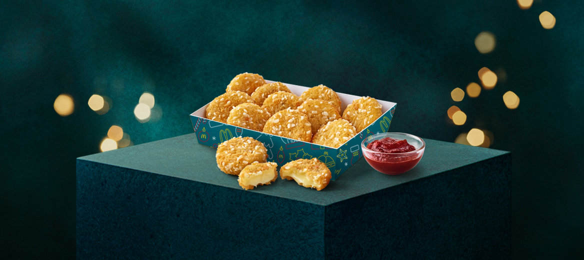 Cheese Melt Dippers with Rich Tomato Dip with a festive dark green background