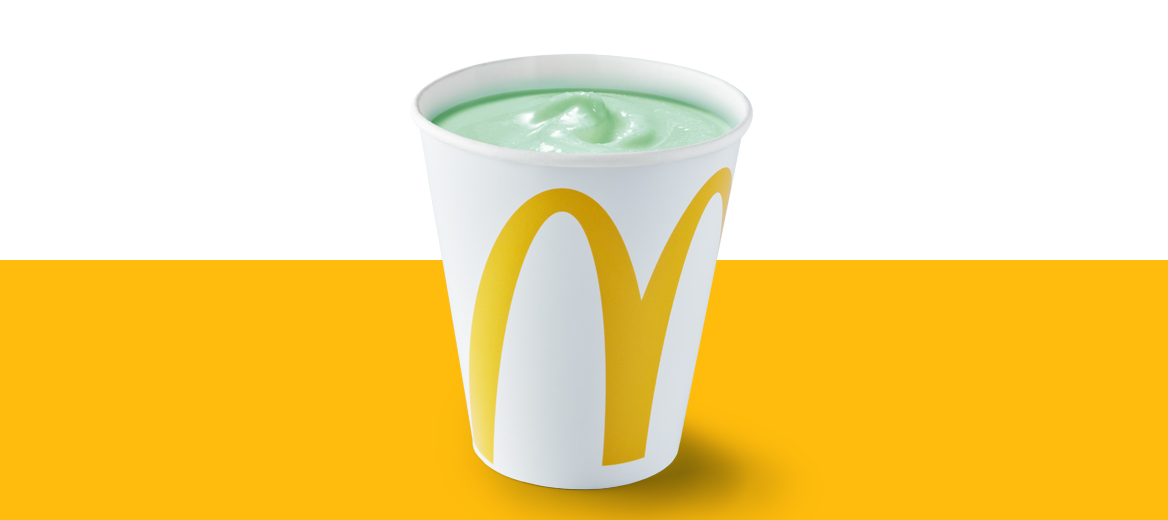 Shamrock Shake on a yellow shelf