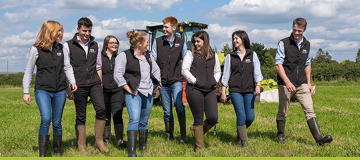 Progressive Young Farmers standing in a field