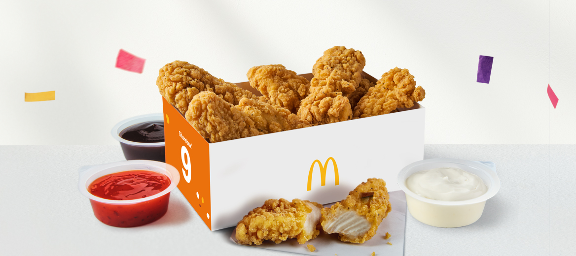 9 Chicken Selects Sharebox® with confetti on a silver metallic background.