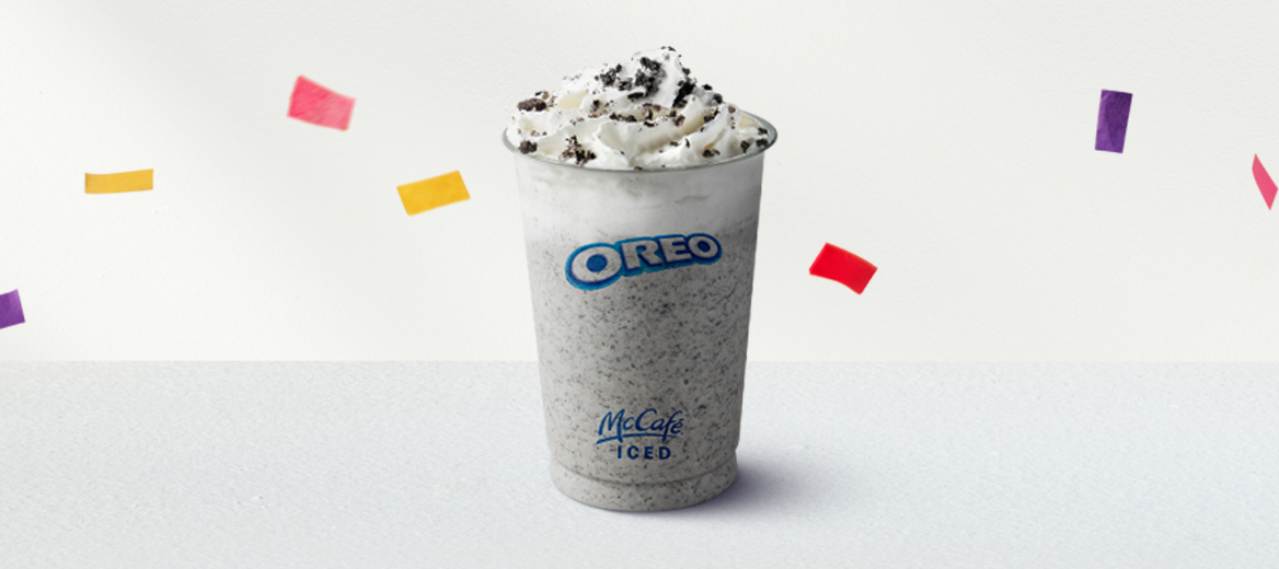 Oreo Frappe with confetti on a silver metallic background.